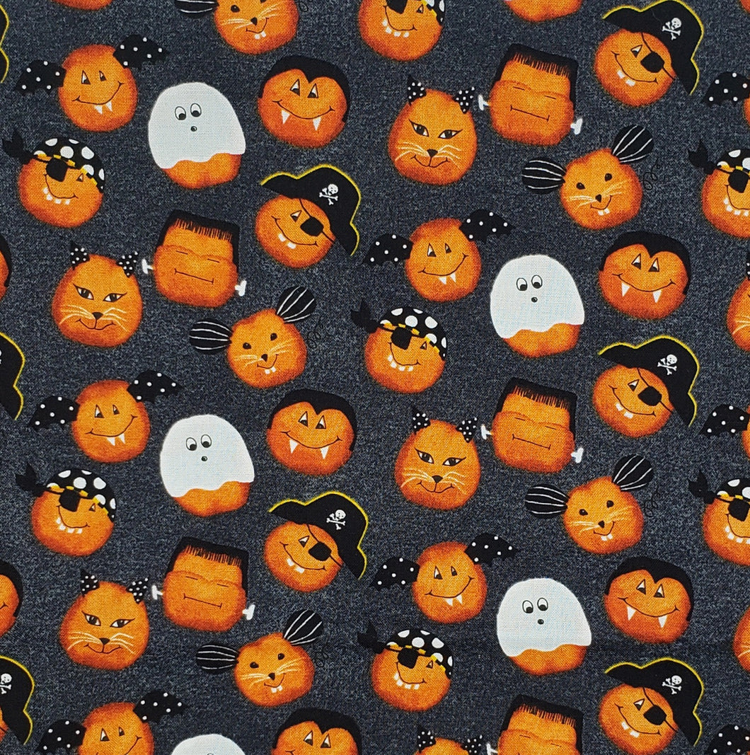 Pumpkins dressed as cats ghosts bats face mask