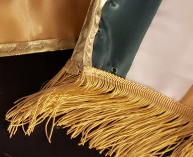 Fringe on ends of sash